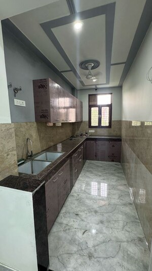 Kitchen in 2 BHK Builder Floor at Palm Residency Chhatarpur, Rajpur Khurd Extension – for Rent