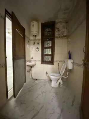 Bathroom in 2 BHK Builder Floor at Chattarpur – for Rent