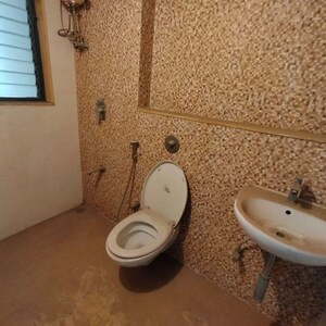 Bathroom in 2 BHK Apartment at Lodha Lakeshore Greens, Hedutane – for Rent