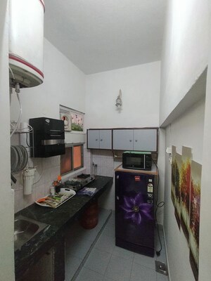 Kitchen in Studio Apartment at Defence Colony – for Rent