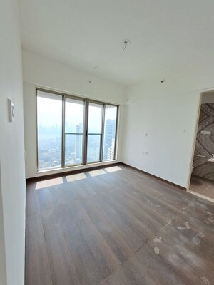 Room in 2 BHK Apartment at Chandak Cornerstone, Worli – for Rent