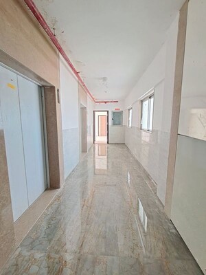 Building Lobby in 2 BHK Apartment at Chandak Cornerstone, Worli – for Rent