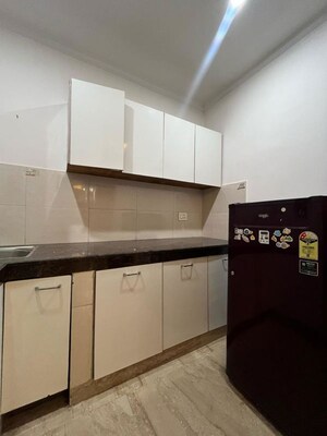 Kitchen in 2 BHK Builder Floor at Freedom Fighters Enclave – for Rent