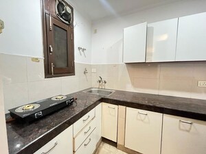 Kitchen in 2 BHK Builder Floor at Freedom Fighters Enclave – for Rent