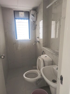 Bathroom in 2 BHK Apartment at Runwal Gardens, Dombivli East – for Rent