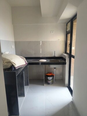 Kitchen in 2 BHK Apartment at Runwal Gardens, Dombivli East – for Rent