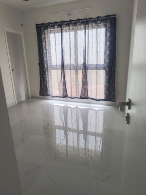 Bathroom in 2 BHK Apartment at Runwal Gardens, Dombivli East – for Rent