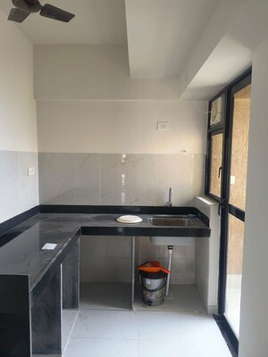 Kitchen in 2 BHK Apartment at Runwal Gardens, Dombivli East – for Rent