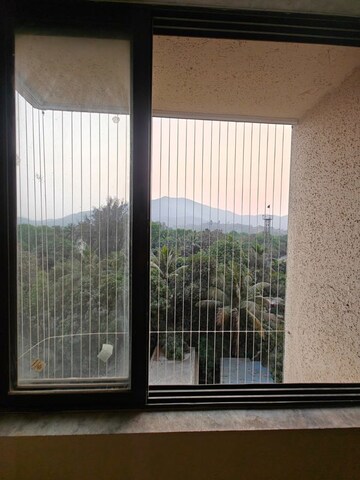 Balcony in 1 BHK Apartment at Ram Pushpanjali Residency, Owale – for Rent