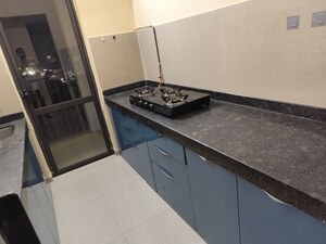 Kitchen in 1 BHK Apartment at Lodha Lakeshore Greens, Dombivli East – for Rent