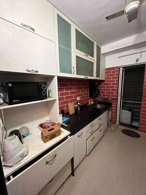 Kitchen in 3 BHK Apartment at Atul Blue Meadows, Andheri East – for Rent