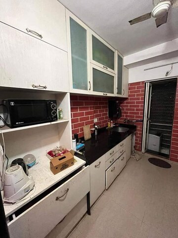 Kitchen in 3 BHK Apartment at Atul Blue Meadows, Andheri East – for Rent