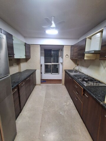 Kitchen in 4 BHK Apartment at Bhagwati Apartments, Santacruz West – for Rent
