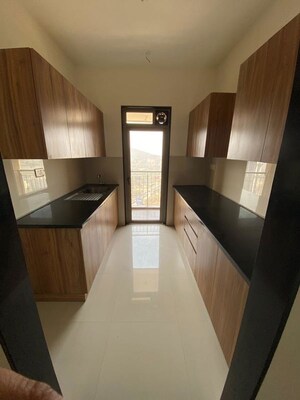 Kitchen in 2 BHK Apartment at Lodha Splendora, Ghodbunder Road – for Rent