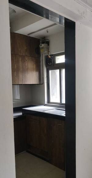 Kitchen in 2 BHK Apartment at Lodha Crown Quality Homes, Majiwada – for Rent