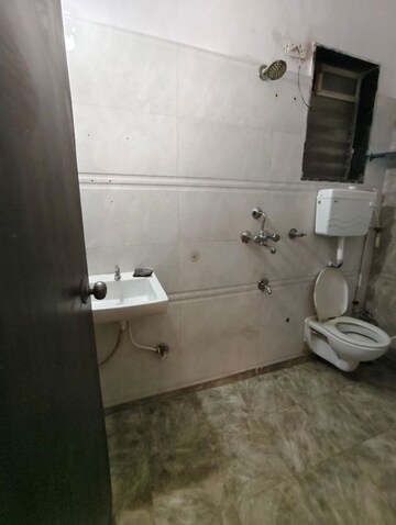 Bathroom in 1 BHK Apartment at Rosa Classique, Kasarvadavali – for Rent