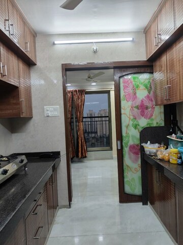 Kitchen in 2.5 BHK Apartment at Neelkanth Greens, Manpada – for Sale