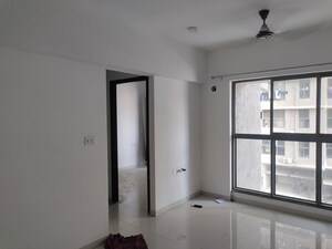 Living Room in 1 BHK Apartment at UK Iridium, Kandivali East – for Rent