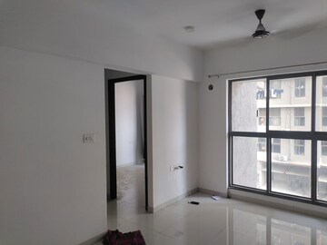 Living Room in 1 BHK Apartment at UK Iridium, Kandivali East – for Rent