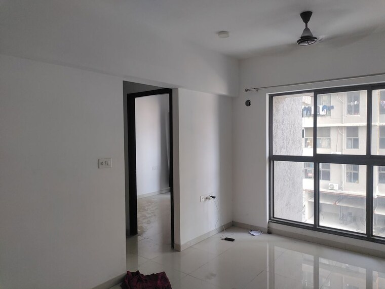 Living Room, uk-iridium 1 Bedroom 400 Sq.Ft. Apartment In Kandivali East Mumbai 10042711