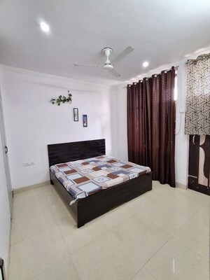 Bedroom in 3 BHK Builder Floor at Ansal Sushant Lok I, Sector 43 – for Rent