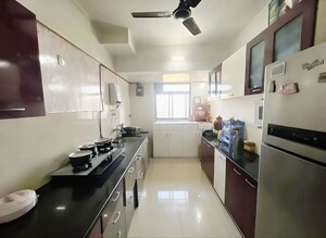 Kitchen in 2.5 BHK Apartment at Puranik City, Kasarvadavali – for Sale