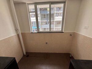 Kitchen in 2 BHK Apartment at Anand Rise Alta, Tathawade – for Rent