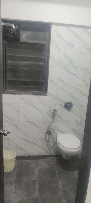 Bathroom in 1 RK Apartment at UK Iridium, Kandivali East – for Rent