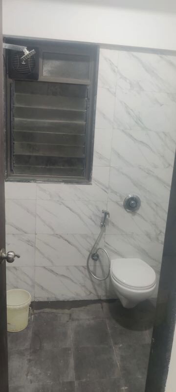 Bathroom in 1 RK Apartment at UK Iridium, Kandivali East – for Rent