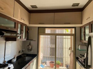 Kitchen in 3 BHK Apartment at Geetanjali CHS Andheri West, Andheri West – for Rent