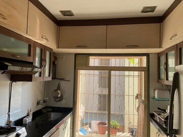 Kitchen in 3 BHK Apartment at Geetanjali CHS Andheri West, Andheri West – for Rent
