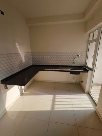 Kitchen in 2 BHK Apartment at Godrej Green Cove, Mahalunge – for Rent