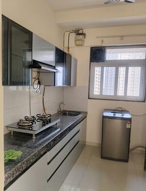 Kitchen in 2 BHK Apartment at Ashar Axis, Majiwada – for Rent