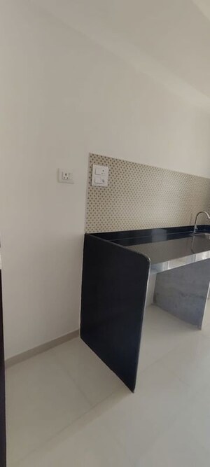 Kitchen in 2 BHK Apartment at Lodha Amara, Kolshet Road – for Sale