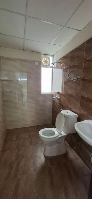 Bathroom in 3 BHK Apartment at Amrapali Crystal Homes, Sector 76 – for Rent