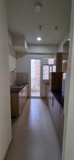 Building Lobby in 3 BHK Apartment at Amrapali Crystal Homes, Sector 76 – for Rent