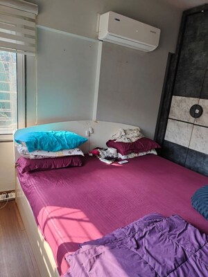 Bedroom in 2 BHK Apartment at DLH Metroview, Andheri West – for Rent