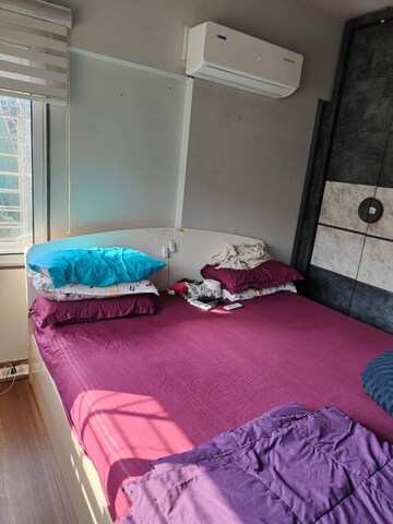 Bedroom in 2 BHK Apartment at DLH Metroview, Andheri West – for Rent