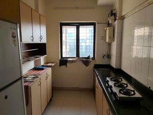 Kitchen in 2 BHK Apartment at Royal Classic Co Op Society, Andheri West – for Rent