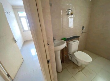 Bathroom in 2 BHK Apartment at Wave Executive Floors, Wave City – for Rent