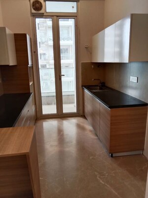 Kitchen in 3.5 BHK Apartment at Omkar Alta Monte, Malad East – for Rent