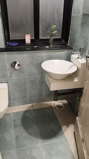 Bathroom in 3 BHK Apartment at DB Realty Shagun Towers, Goregaon East – for Rent