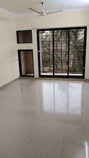 Room in 2 BHK Apartment at Swapnalok Towers, Malad East – for Rent