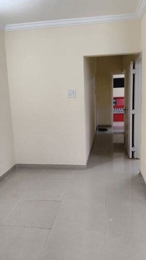 Room in 2 BHK Apartment at Swapnalok Towers, Malad East – for Rent