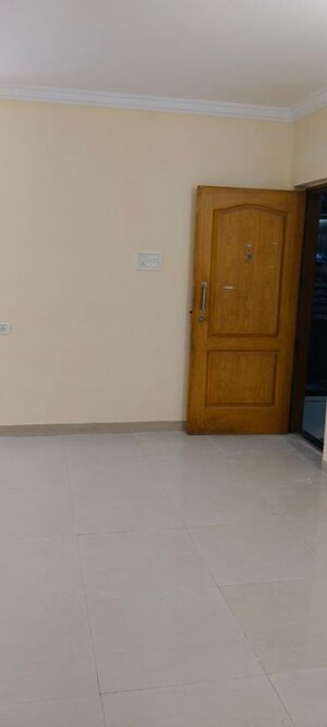 Room in 2 BHK Apartment at Swapnalok Towers, Malad East – for Rent
