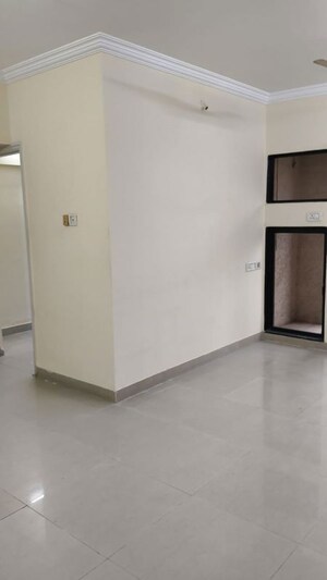 Room in 2 BHK Apartment at Swapnalok Towers, Malad East – for Rent