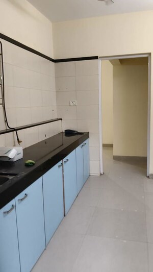 Kitchen in 2 BHK Apartment at Swapnalok Towers, Malad East – for Rent