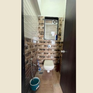 Bathroom in 1 BHK Apartment at Shraddha Evoque, Sonapur – for Sale
