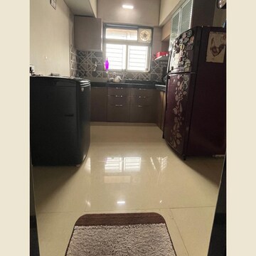 Kitchen in 1 BHK Apartment at Shraddha Evoque, Sonapur – for Sale