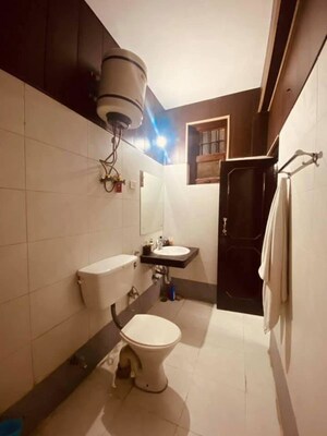 Bathroom in 3 BHK Apartment at Ansal Sushant Estate, Sector 52 – for Rent